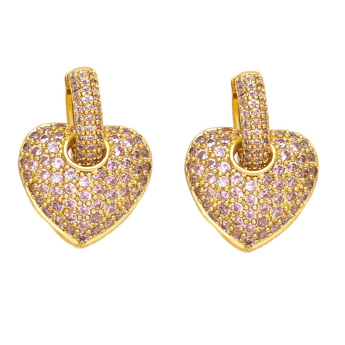 1 Paar elegante Streetwear-Ohrstecker in Herzform mit Inlay aus Kupfer und Zirkon vergoldet