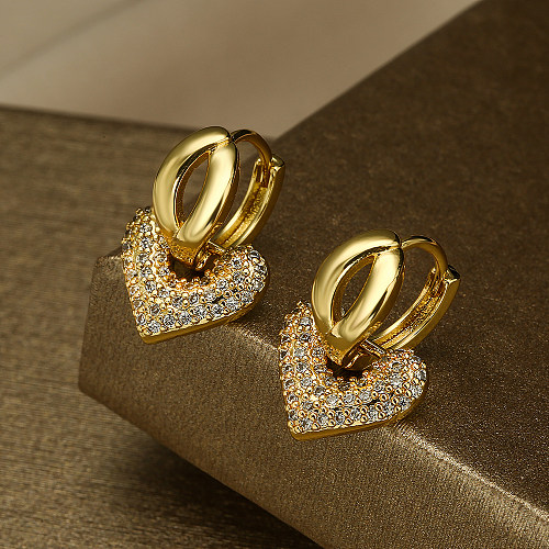 1 par de pendientes colgantes chapados en oro de 18K con incrustaciones de circonita de cobre y gotas de agua elegantes con forma de corazón