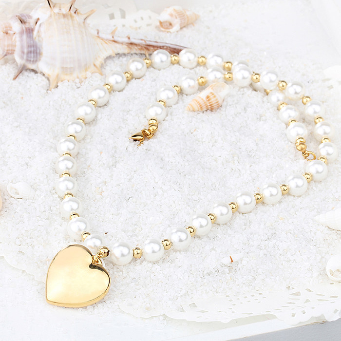 Elegante Herzform aus Edelstahl mit künstlichen Perlen, Armbänder, Ohrringe, Halskette