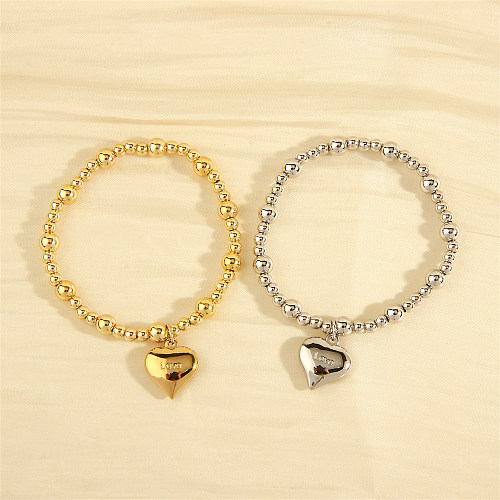 Charme de cuivre de forme de coeur de lettre de style simple plaquant les bracelets plaqués par or 18K