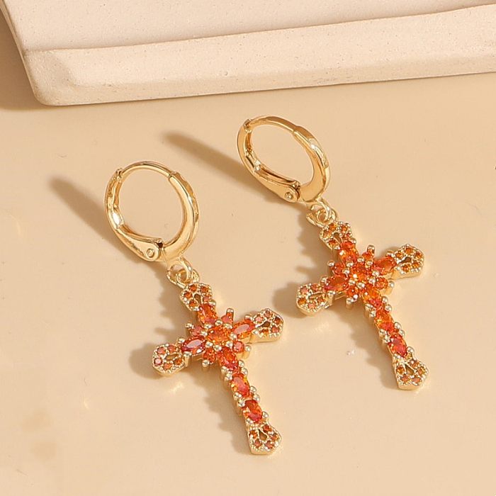 1 paire de boucles d'oreilles pendantes plaquées or 14 carats avec incrustation de cuivre et de croix de style classique