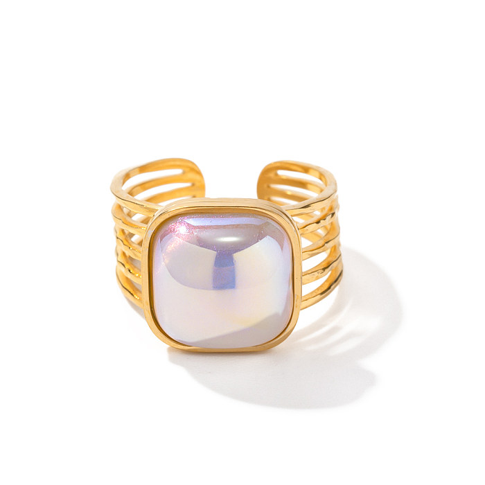 Pendientes de anillos chapados en oro de 18 quilates con incrustaciones de perlas de acero inoxidable con forma de corazón ovalado de estrella estilo IG
