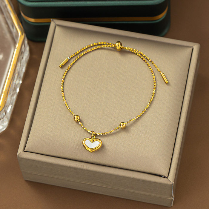 Schlichter Stil, herzförmig, mit Titan-Stahlbeschichtung, vergoldete Ohrringe, Halskette