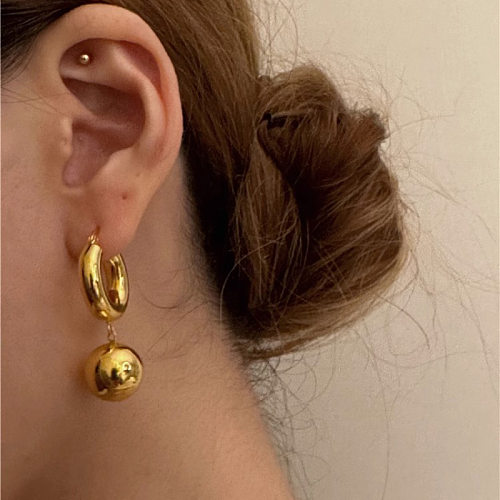 1 paire de boucles d'oreilles pendantes en cuivre, boule streetwear rétro