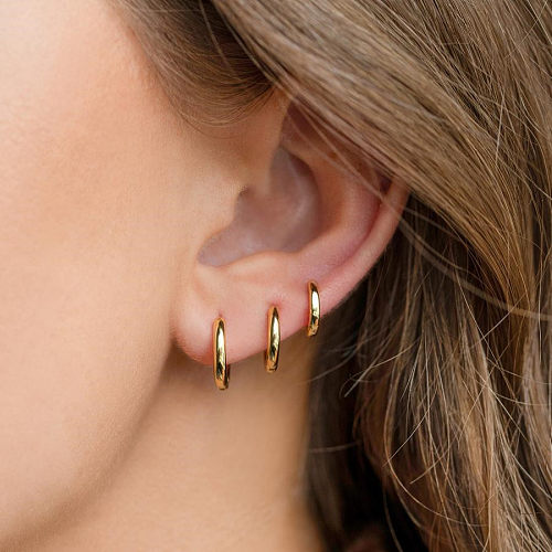 Boucles d'oreilles brillantes géométriques à la mode, plaquées cuivre