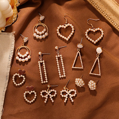 Boucles d'oreilles pendantes en forme de cœur avec incrustation de perles en cuivre, 1 paire