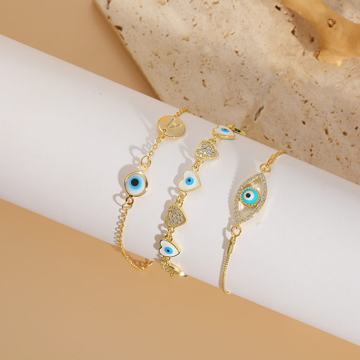 Pulseras chapadas en oro de 14K con incrustaciones de esmalte de cobre y ojo en forma de corazón de estilo clásico lujoso y elegante