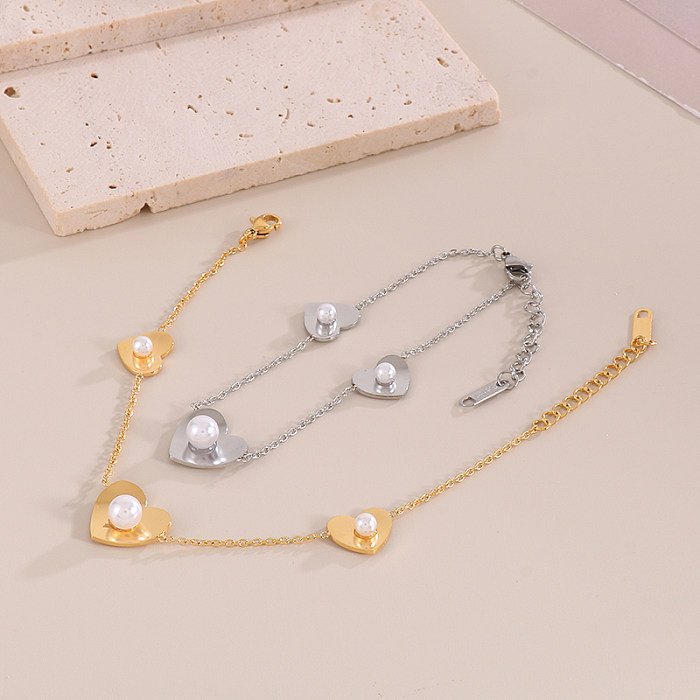 Style simple en forme de coeur papillon titane acier placage incrustation de perles artificielles plaqué or 18 carats boucles d'oreilles collier ensemble de bijoux