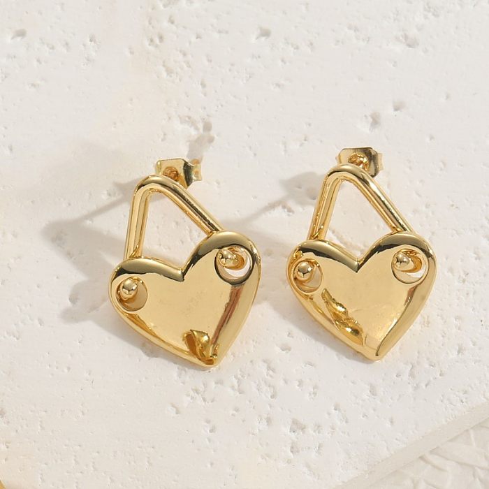 1 Paar elegante, schlichte Herzform-Ohrstecker mit Kupferbeschichtung und Inlay aus Zirkon mit 14-Karat-Vergoldung