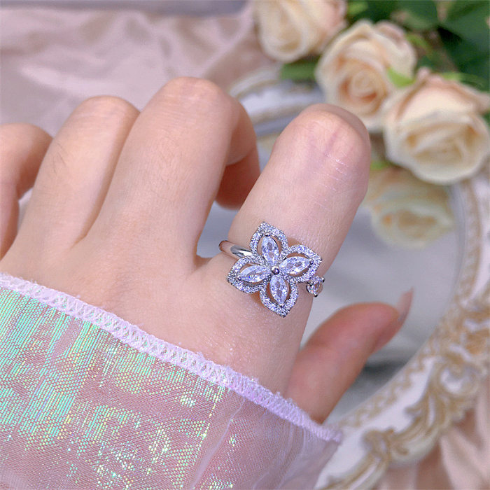 Rotierender beweglicher Ring, Blumen-Zirkon-Super-Flash-Ring, Öffnung, Farbbeständigkeit, Nischendesign, modisches Hand-Accessoire, weibliche Mode