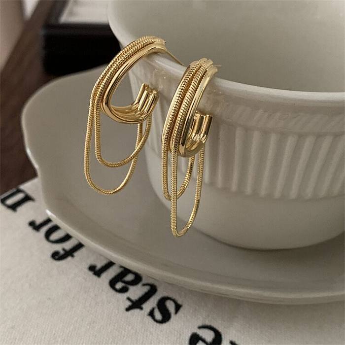 1 paire de boucles d'oreilles pendantes en cuivre plaqué géométrique de style moderne