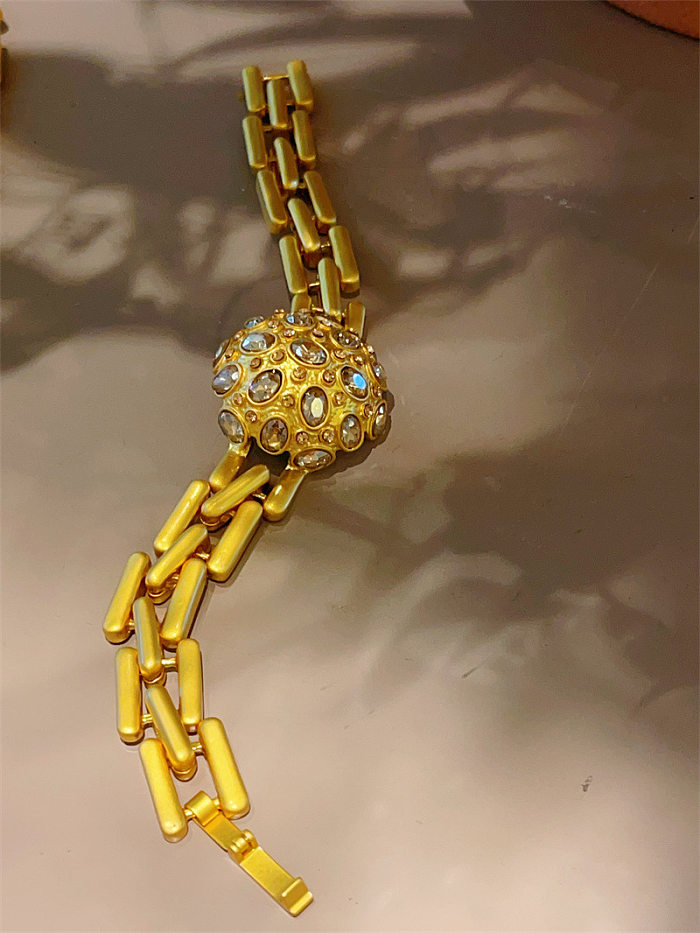 Schmuckset im Vintage-Stil mit einfarbiger Verkupferung, Inlay aus Zirkon und 18 Karat Gold
