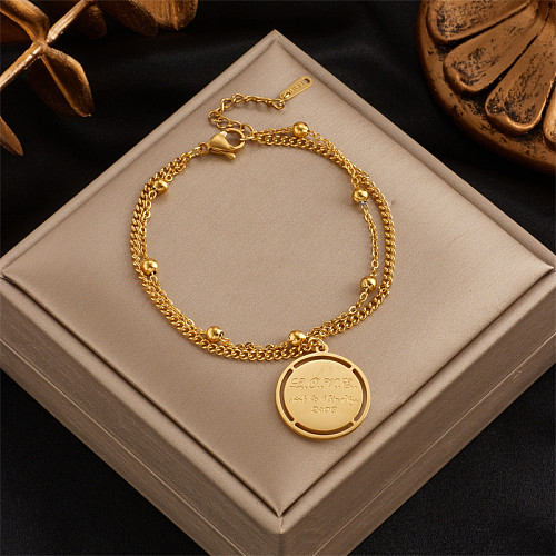 Bracelets plaqués or 18 carats en acier titane avec lettres rétro, vente en gros