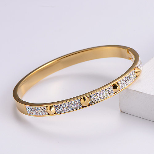 Bracelet en acier inoxydable à clous à la mode serti de diamants
