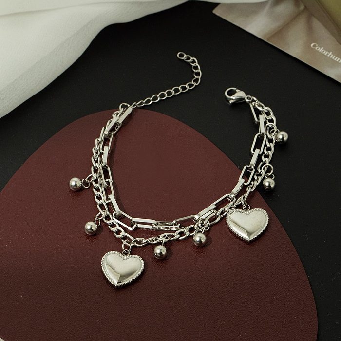 Bracelets plaqués or en acier titane en forme de cœur de style simple
