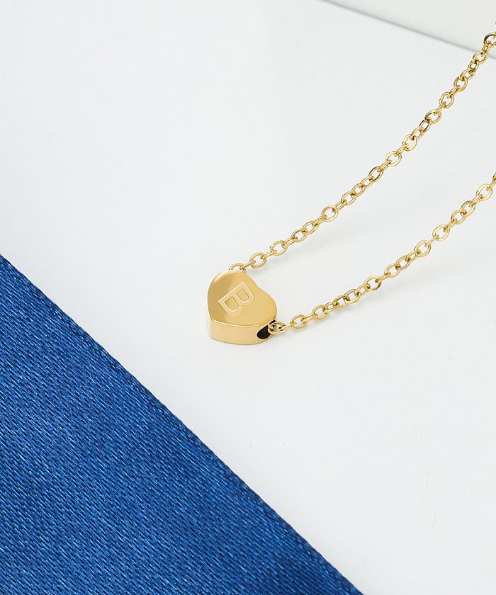 Bijoux de Style coréen avec lettrage en forme de cœur, pendentif de 26 lettres, collier en acier inoxydable, vente en gros de bijoux