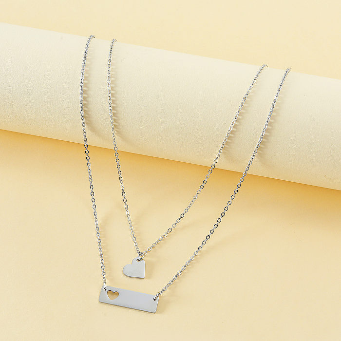 Collar hueco pulido de acero inoxidable con forma de corazón de estilo simple, 2 piezas