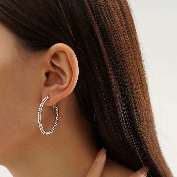 1 paire de boucles d'oreilles créoles en acier inoxydable plaqué couleur unie pour femme