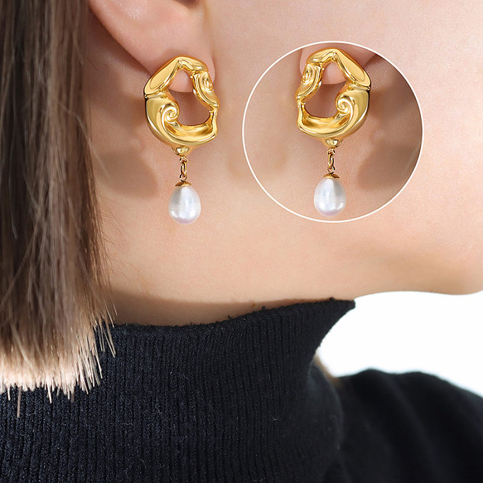 1 paire de clous d'oreilles géométriques en acier inoxydable, incrustation de perles à la mode