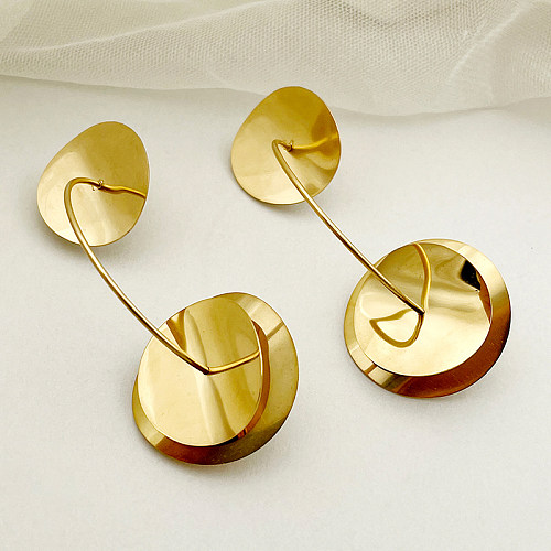 1 par de pendientes chapados en oro de acero inoxidable redondos de estilo simple