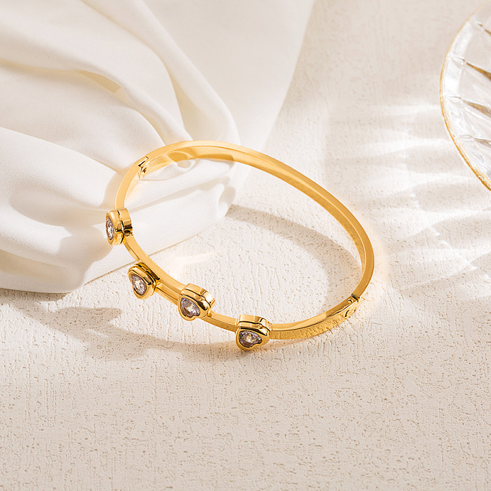 Atacado estilo IG elegante formato de coração em aço inoxidável banhado a ouro 18K pulseira de zircão