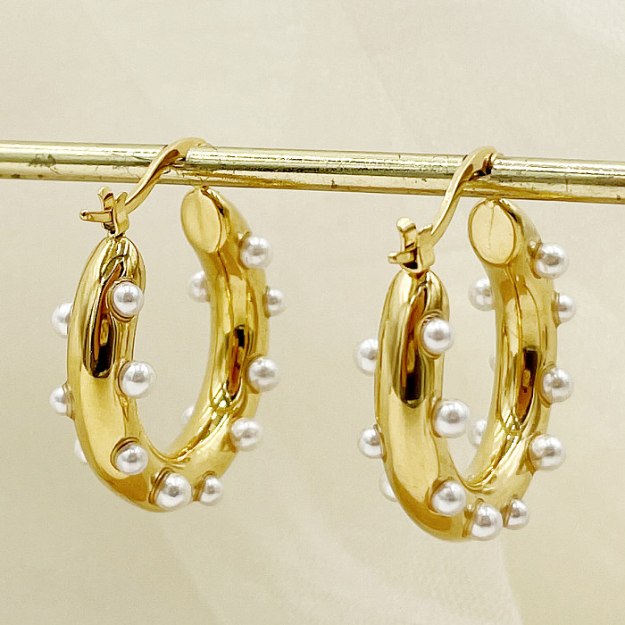 1 Paar elegante U-förmige Creolen aus Edelstahl mit Polierbeschichtung und Inlay, perlmuttvergoldet