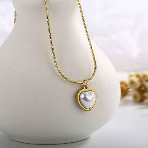 Collar con colgante de perlas con incrustaciones de revestimiento de acero inoxidable de color sólido de estilo simple y dulce