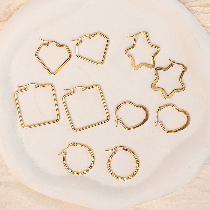 1 par de brincos de argola banhados a ouro em aço inoxidável estilo simples estrela em forma de coração