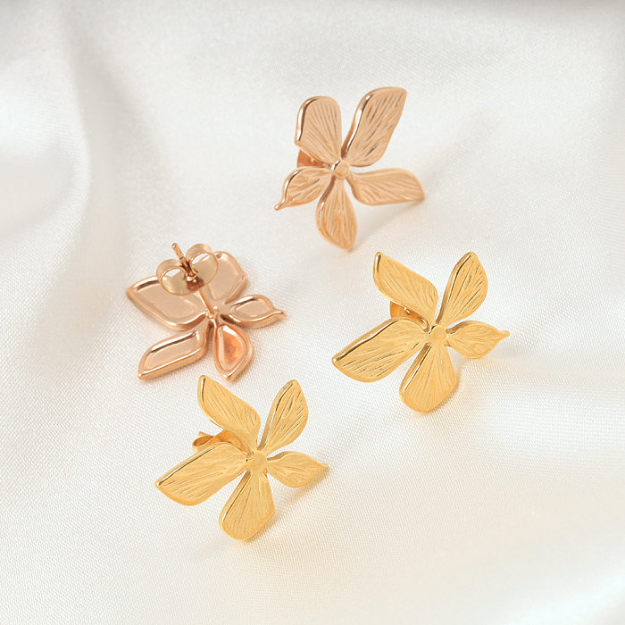 1 paire de clous d'oreilles en acier inoxydable plaqué or rose 18 carats avec fleur de style simple