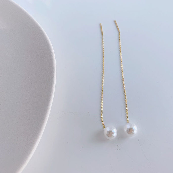 Línea de oreja de perla con incrustaciones de revestimiento de acero inoxidable con borlas de estilo simple 1 par