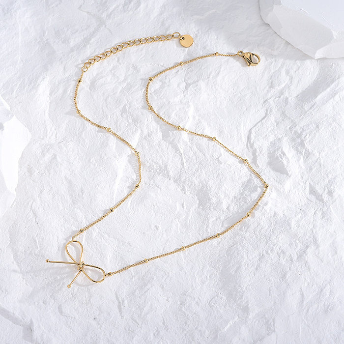 Collier pendentif plaqué or avec nœud papillon Commute en acier inoxydable