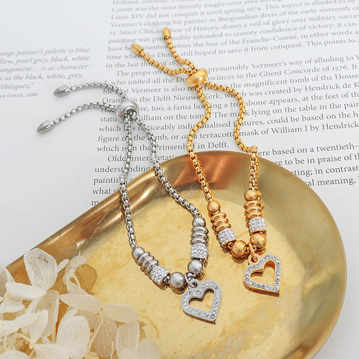 Bracelets en Zircon incrustés de breloques en acier et titane en forme de cœur brillant élégant