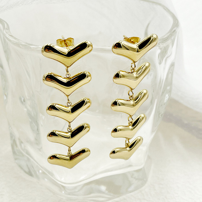 1 par de brincos de gota banhados a ouro em formato de coração exagerado em aço inoxidável com borla de metal