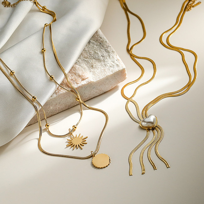 Schlichter Pendel-Halskette mit geometrischem Anhänger aus Edelstahl mit 18-Karat-Vergoldung