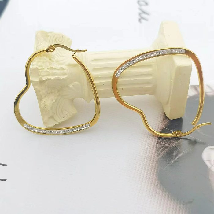 1 paire de boucles d'oreilles en forme de cœur de Style moderne, incrustation de placage en acier inoxydable, diamant artificiel