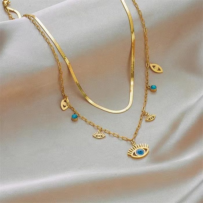 Mehrschichtige Halsketten mit Streetwear-Eye-Edelstahlbeschichtung und türkisfarbener Einlage