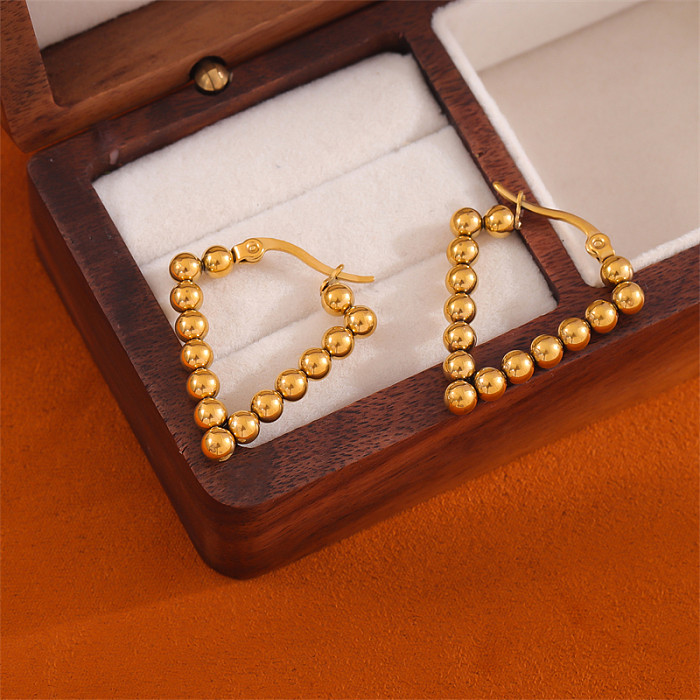 1 Paar schlichte, unregelmäßige runde Edelstahl-Ohrringe mit 18-Karat-Vergoldung