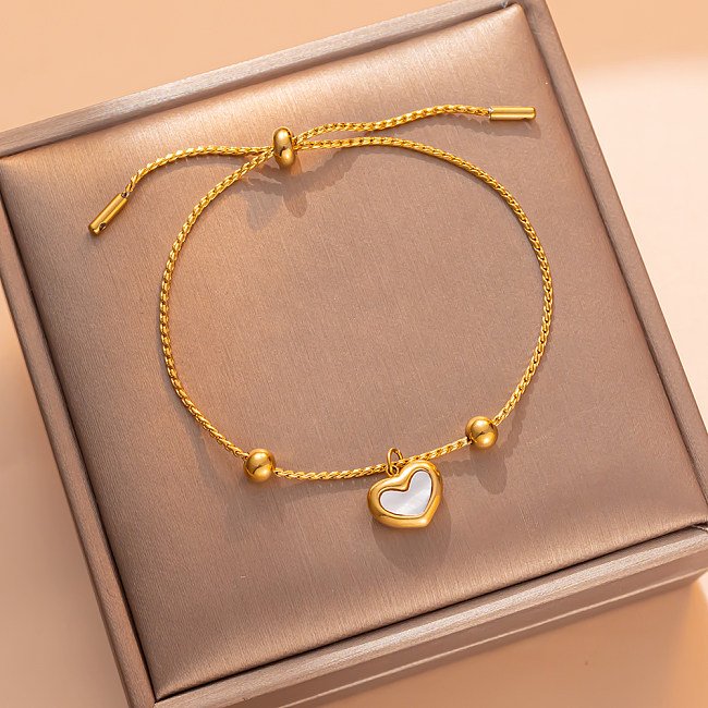 Pulseiras banhadas a ouro 18K com revestimento de aço em forma de coração estilo elegante e simples