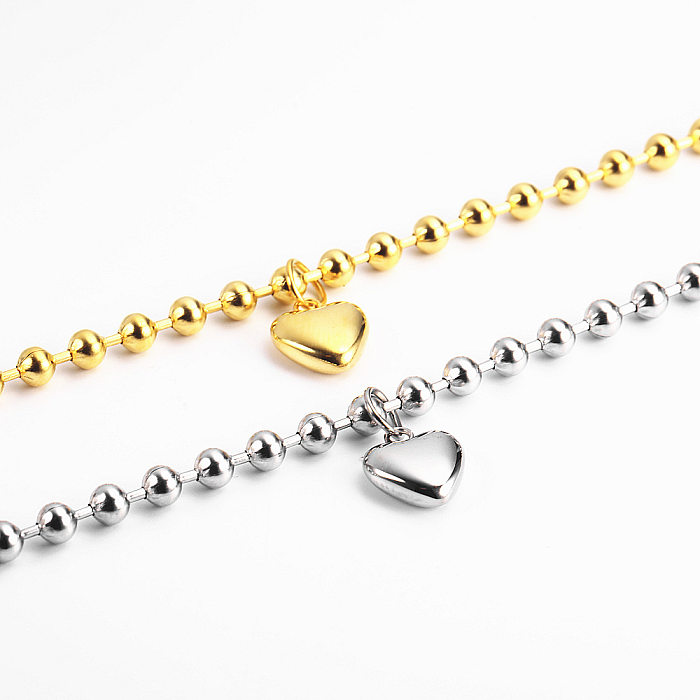 Pulseiras de aço de titânio em forma de coração da moda com revestimento de pulseiras de aço inoxidável