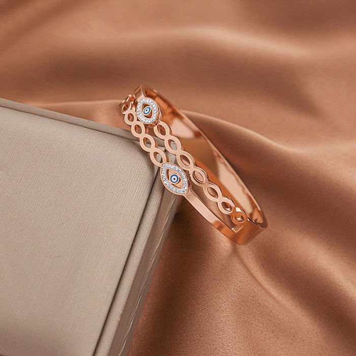 Classic Style Four Leaf Clover Devil'S Eye Titanium Steel Rose Gold Plated Gold Plated Zircon Bangle In Bulk