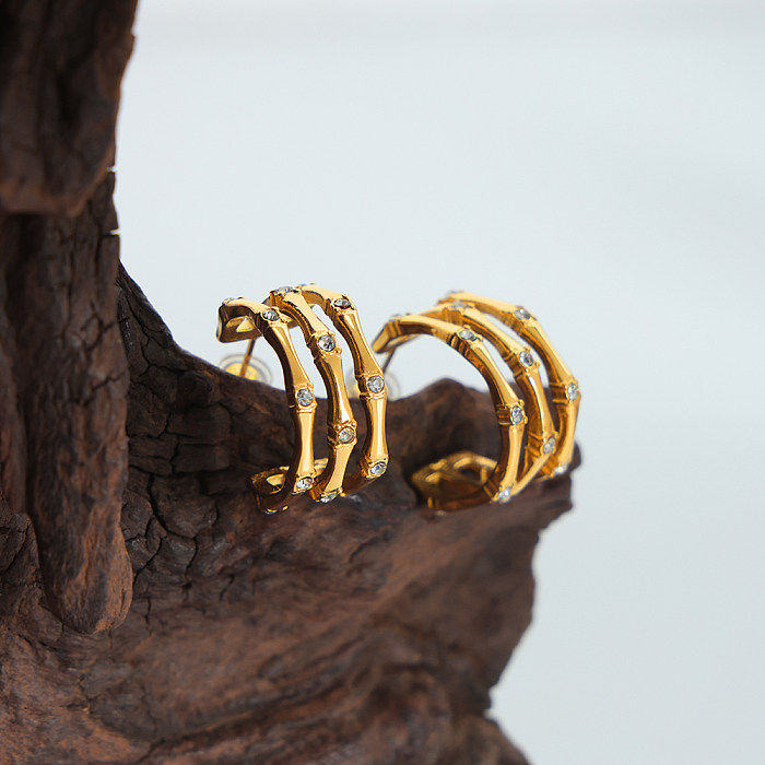 1 par de strass elegante e luxuoso com revestimento geométrico embutido em aço inoxidável com strass banhados a ouro 18K