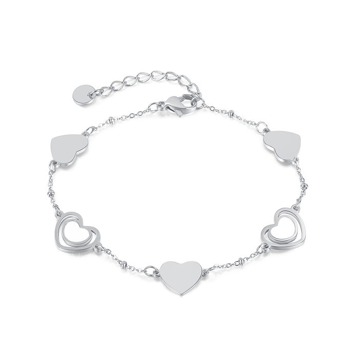 Bracelets en acier inoxydable en forme de coeur de mode ne plaquant aucun bracelet en acier inoxydable incrusté