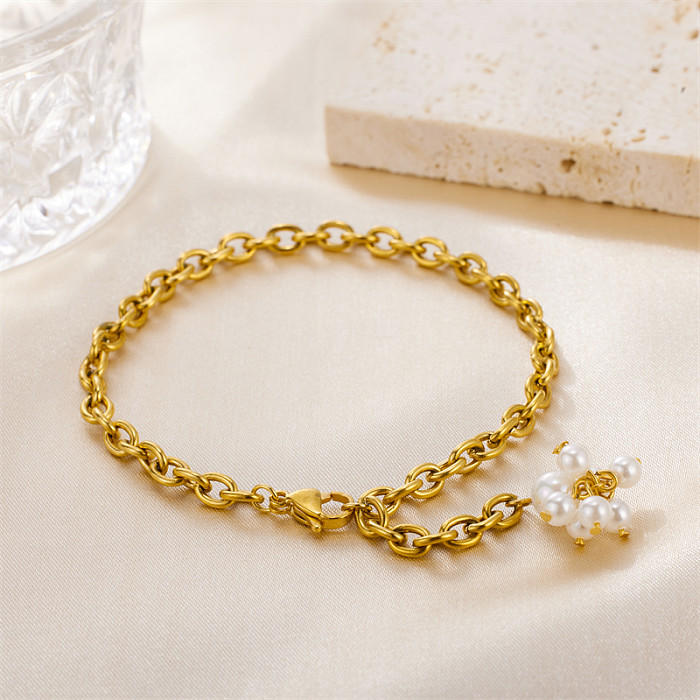 Venta al por mayor Pulseras chapadas en oro de 18 quilates con revestimiento de perlas de agua dulce de acero inoxidable con flores de estilo simple
