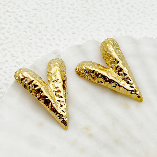 1 par de brincos de orelha banhados a ouro de aço inoxidável estilo simples romântico em formato de coração