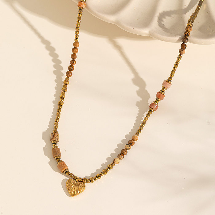 Herzförmige Anhänger-Halskette im Ethno-Stil aus Edelstahl mit Perlenlegierung und 18-Karat-Vergoldung