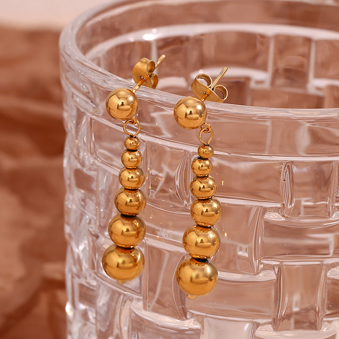 1 par de brincos de gota banhados a ouro 18K de aço inoxidável com revestimento de cor sólida estilo simples