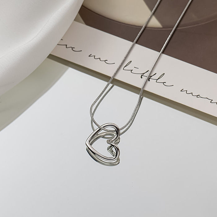 Collier de placage en acier inoxydable en forme de coeur de style simple rétro