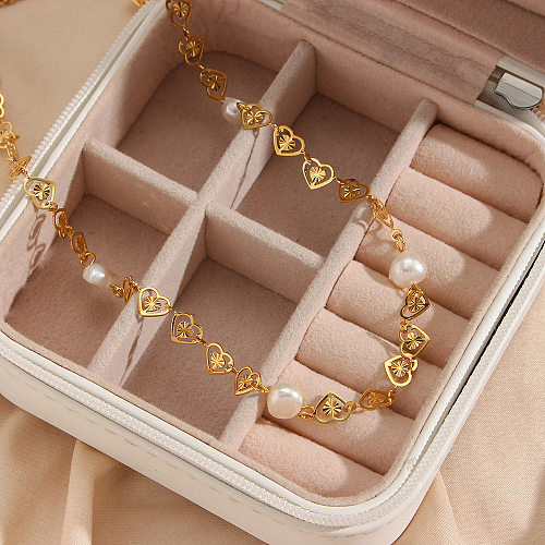 Modische herzförmige Halskette aus vergoldetem 18-Karat-Edelstahl mit vier Perlen
