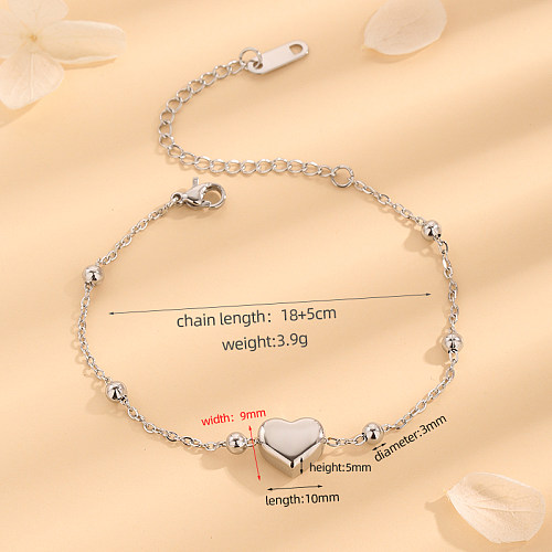 Bracelets plaqués or 18 carats en acier titane en forme de cœur, style Simple et décontracté, vente en gros