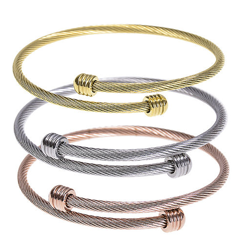 Bracelet en acier inoxydable torsadé de couleur unie de style simple en vrac
